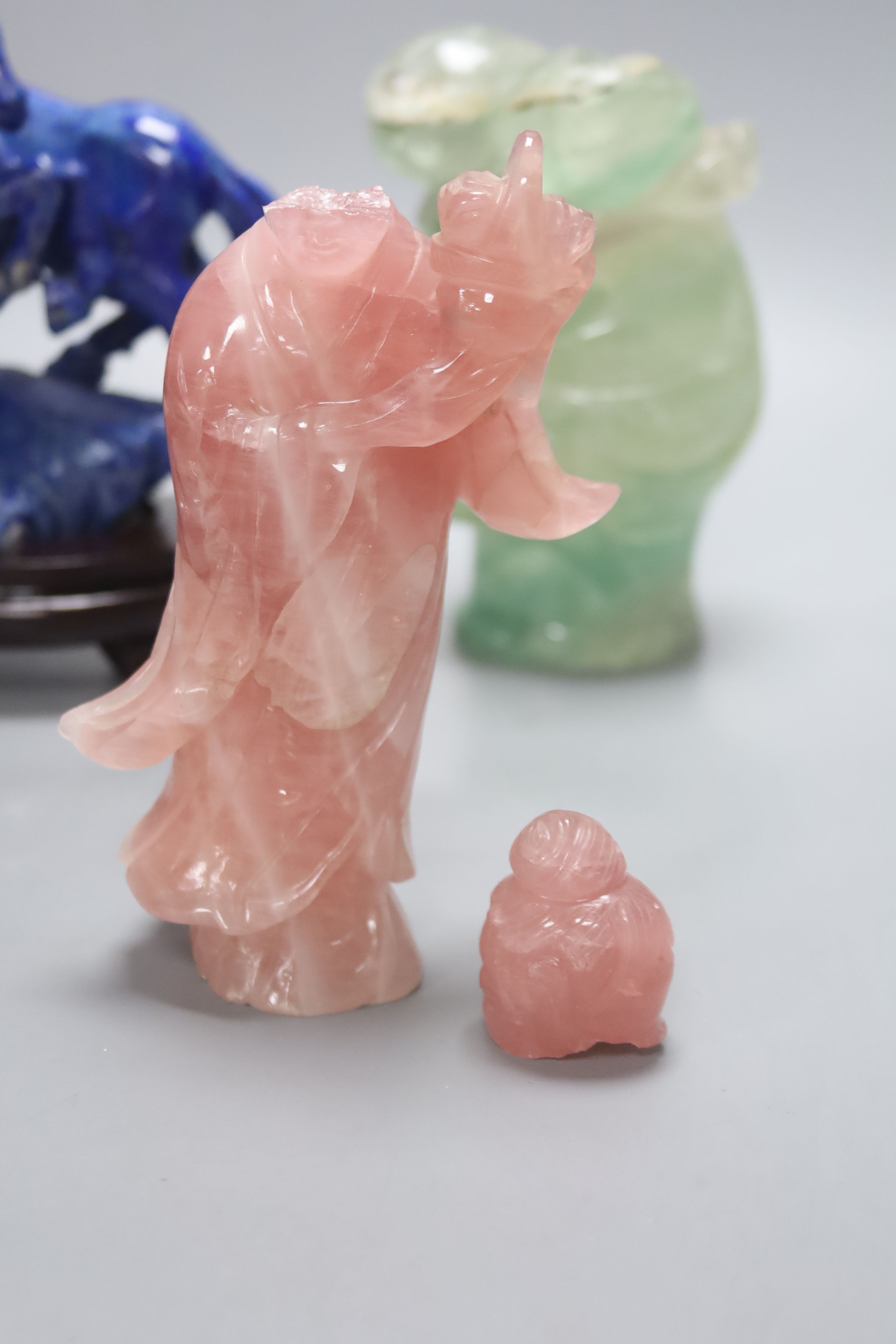 Five Chinese hardstone carvings, tallest 23.5cm